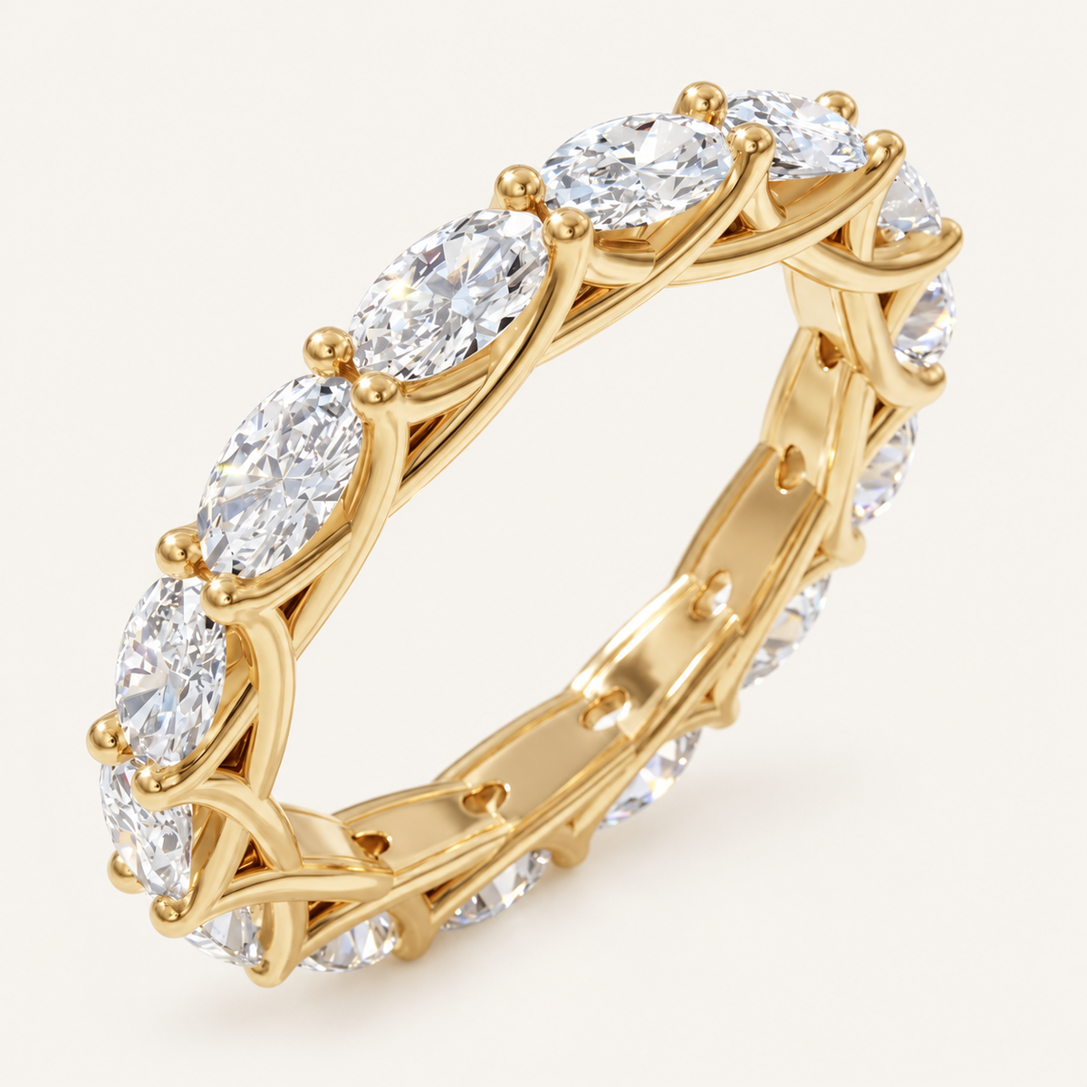 2.5ct Natural Oval Diamond Full Eternity Ring – Elegant Claw Design in yellow gold on an ivory background