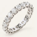 2ct Lab Diamond Full Eternity Ring in white metal on an ivory background