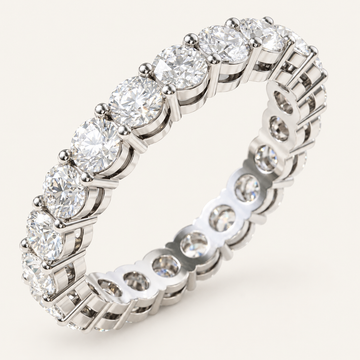 2ct Lab Diamond Full Eternity Ring in white metal on an ivory background