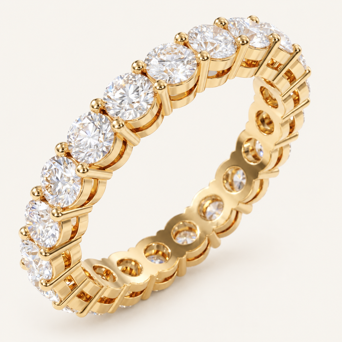 2ct Natural Diamond Full Eternity Ring in yellow gold on an ivory background