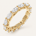 2ct Natural Oval Diamond Full Eternity Ring – Interwoven Claw Design in yellow gold on an ivory background
