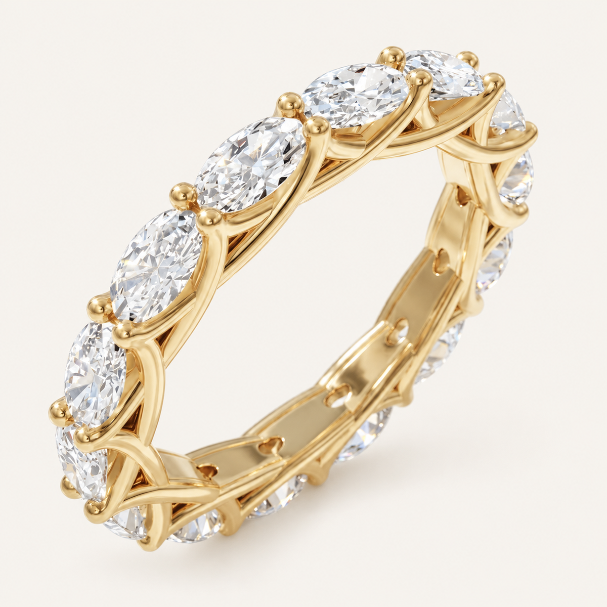 2ct Natural Oval Diamond Full Eternity Ring – Interwoven Claw Design in yellow gold on an ivory background
