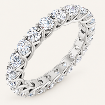 2ct Round Lab-Grown Diamond Full Eternity Ring – Crossover Design, Handcrafted in white metal on an ivory background