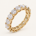 3ct Lab Diamond Full Eternity Ring in yellow gold on an ivory background