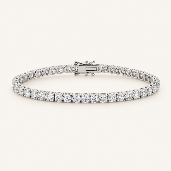 Diamond tennis bracelet in white gold on an ivory background