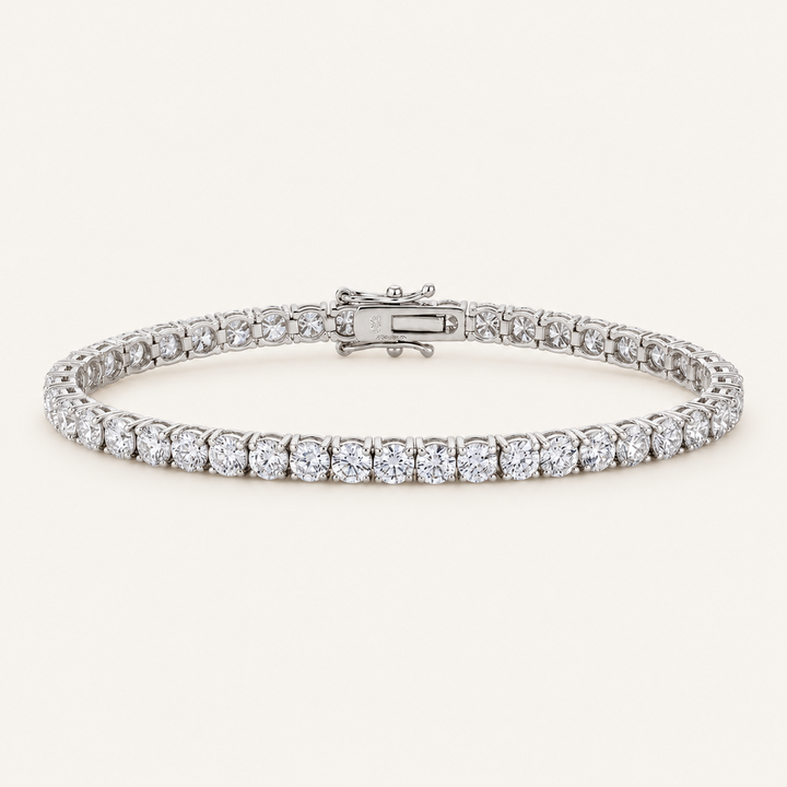 Diamond tennis bracelet in white gold on an ivory background