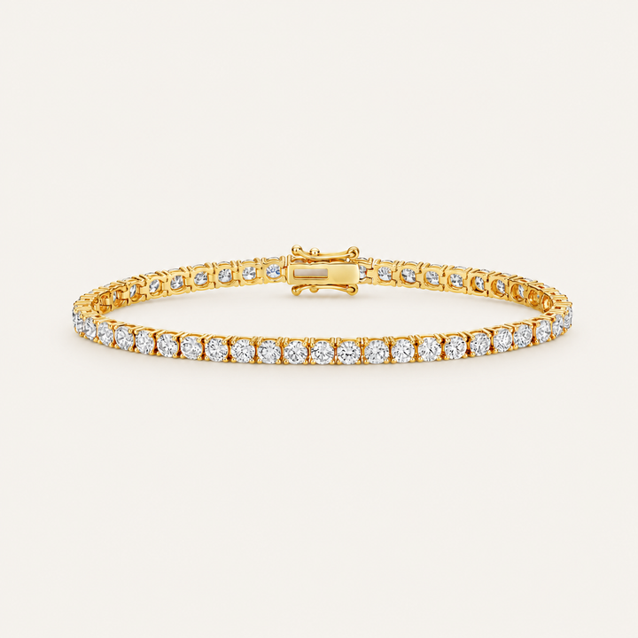 Diamond tennis bracelet in yellow gold on an ivory background