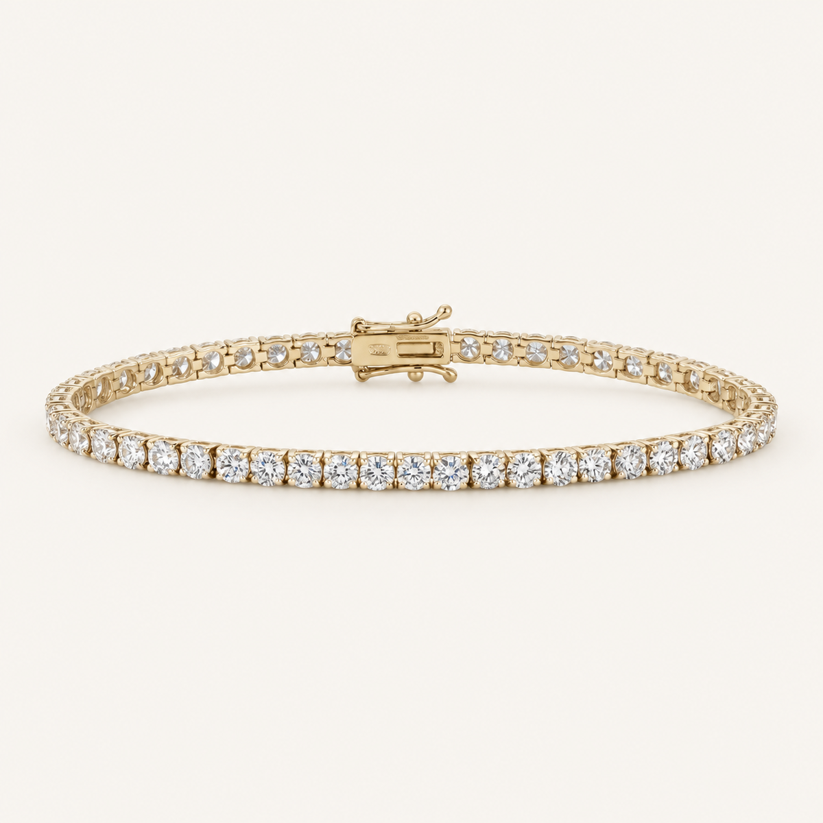 Diamond tennis bracelet in yellow gold on an ivory background