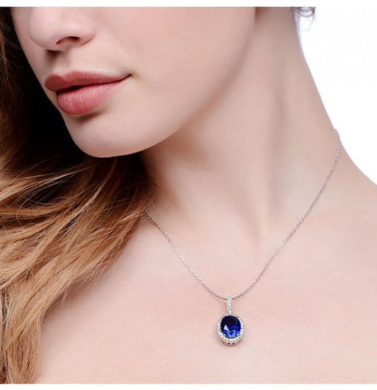 Silver Oval Cluster Deep Blue Cubic Zirconia Pendant with 18" Chain